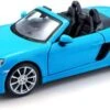 Bburago Modellauto Porsche 718 Boxster (blau, Maßstab 1:24)